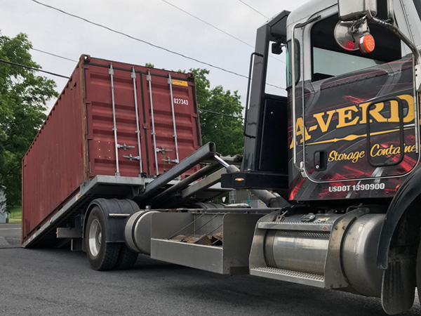 A-Verdi truck relocating storage container