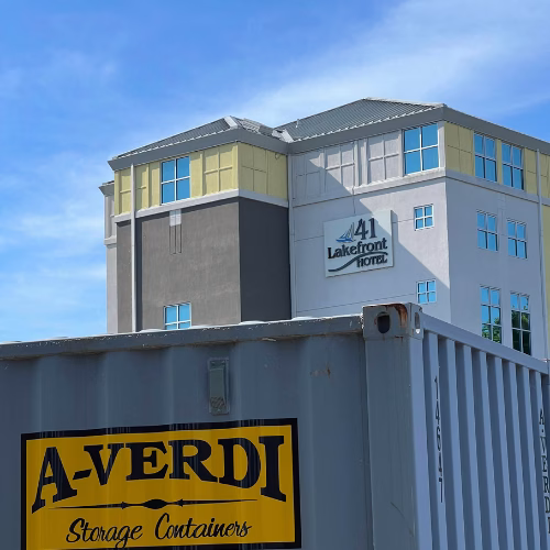 Commercial Storage Rentals That Work as Hard as You Do from A-Verdi A-Verdi portable storage container rental at a commercial building site in New York, providing secure on-site storage for hotels and businesses.