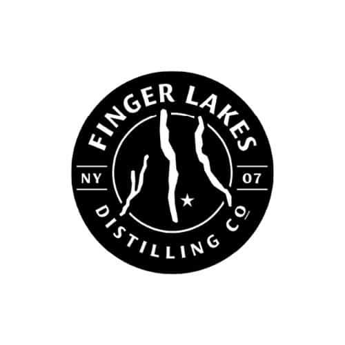 A circular black-and-white emblem with stylized white lines representing the Finger Lakes inside, surrounded by the words “Finger Lakes Distilling Co” along the border, with “NY” on the left and “07” on the right.