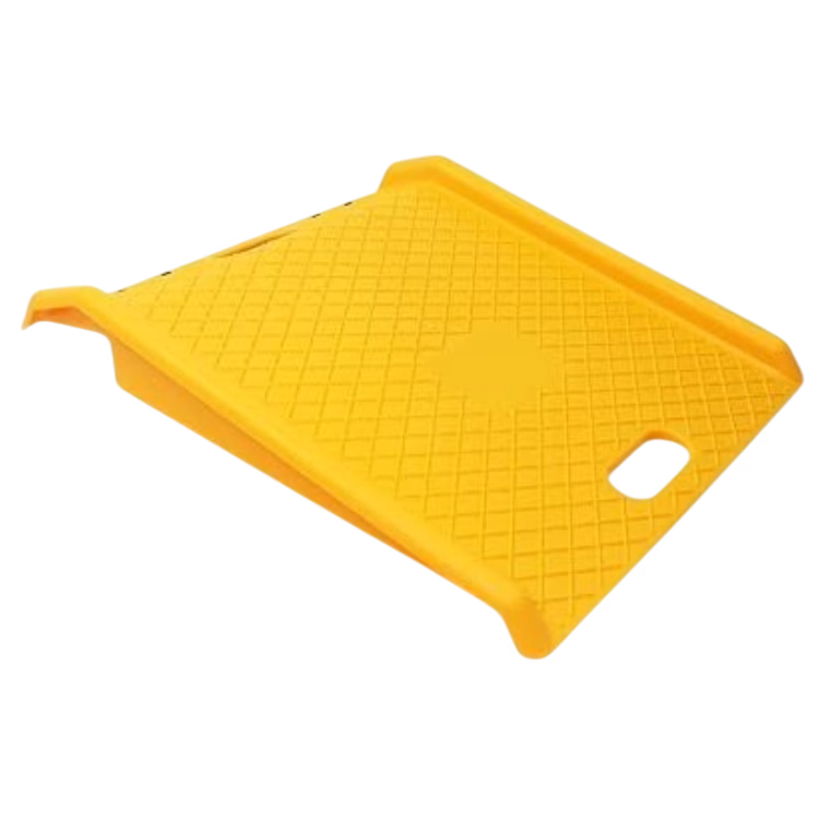 Bright yellow portable ramp with textured surface
