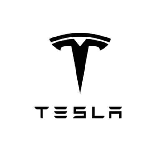 Black Tesla design featuring a stylized “T” emblem above the brand name “TESLA” in a futuristic, geometric font.