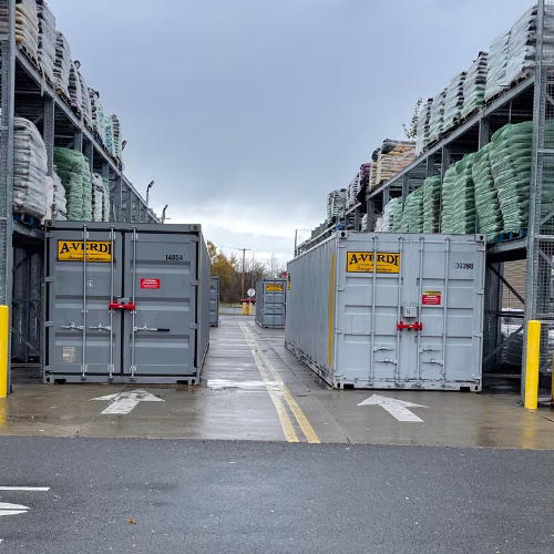 A-Verdi On-Site Storage Designed for Efficient Inventory Control A-Verdi storage containers used for organized commercial inventory storage at a warehouse facility with racked materials.