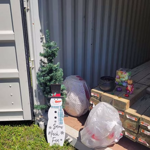 Seasonal Storage Without the Clutter Seasonal decorations and household items stored inside a residential storage container for organized seasonal storage.